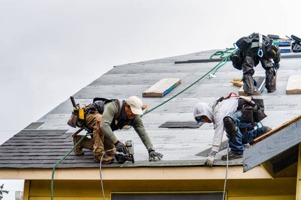 Professional Roof Installation technician working in Harrah, WA